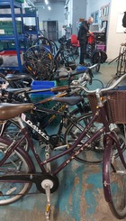Bikes being refurbished at CGX Cycle Works by local staff and volunteers